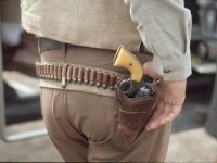 dominis-john-gun-and-holster-belonging-to-actor-john-wayne-during-filming-of-western-movie-the-u.jpg