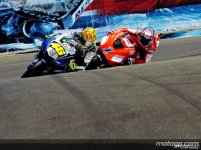 233994_valentino+rossi+riding+side+by+side+with+casey+stoner-1280x960-oct14.jpg