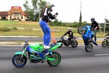 Texting-While-Standing-on-Motorcycle.jpg