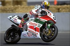 AMA hall of famer Mr John Kocinski racing the Castrol Honda RC45 at the 1997 WSBK round in Lagun.jpg