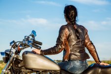 Canva-Biker-Girl-on-a-Motorcycle.jpg